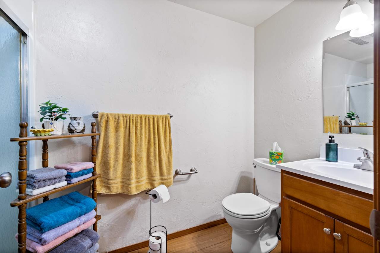 Unit bathroom with vanity and shower
